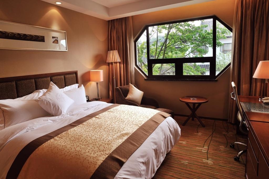 Hentique Huijin Resort Hotel Yangzhou Esterno foto
